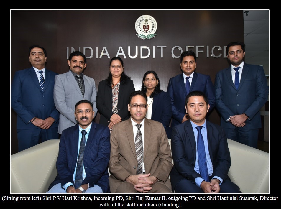 (Left to Right sitting) Shri P.V. Hari Krishna, Principal Director (incoming), Shri Raj Kumar (II), Principal Director (outgoing) and Shri Hautinlal Suantak, Director; Other officials of the office (Standing)